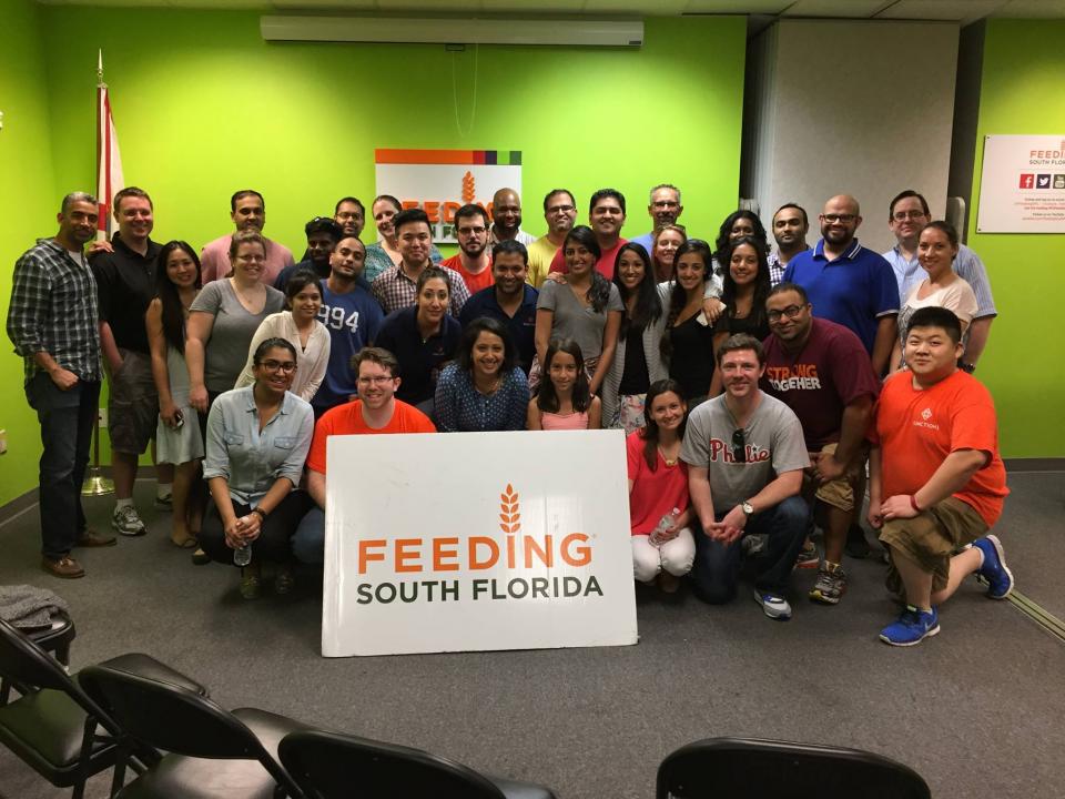 Function1 (and significant others) help organize the food bank at Feeding South Florida during our 2015 Annual Retreat