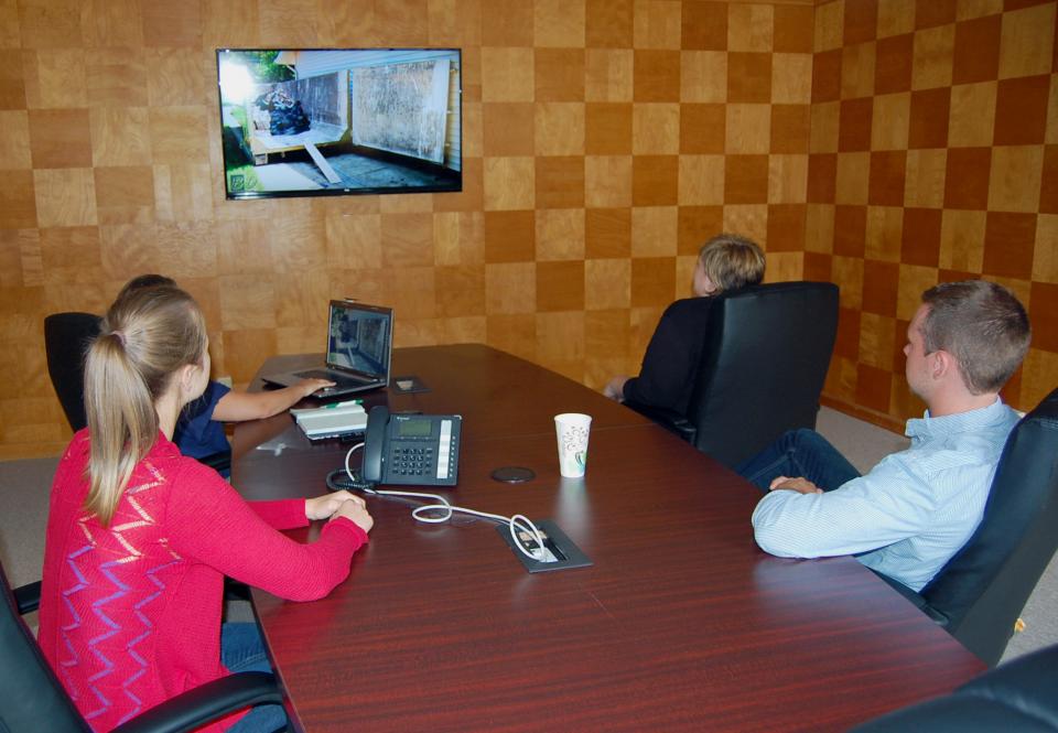 A Group Meeting in One of Conference Rooms