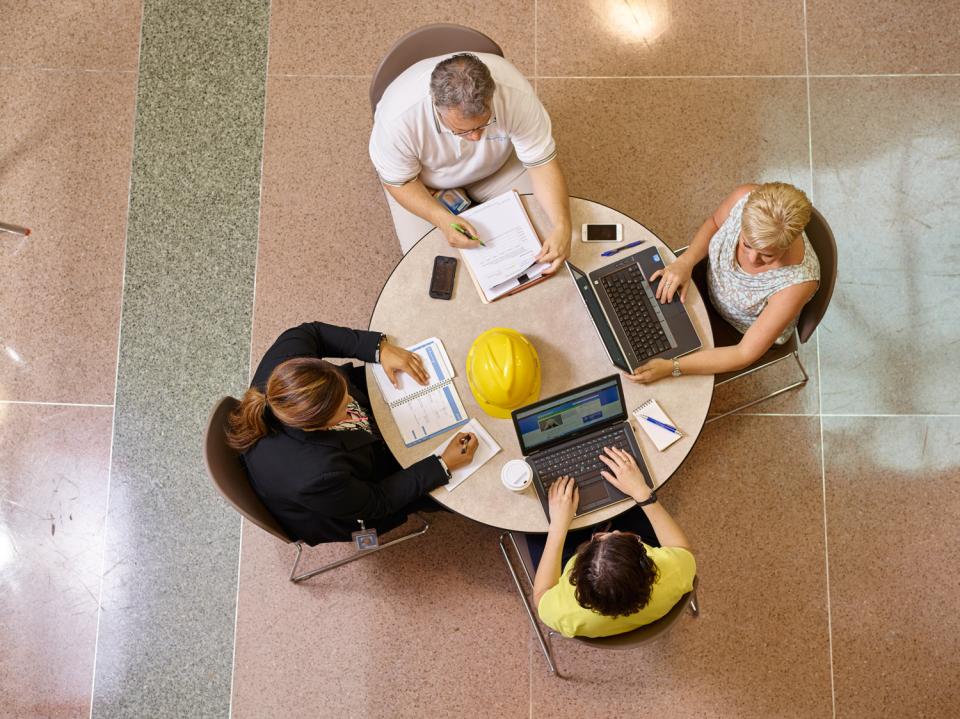 Employees meeting at our headquarters