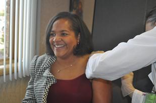 CEO Gets her flu shot at MPHI Flu shot Clinic