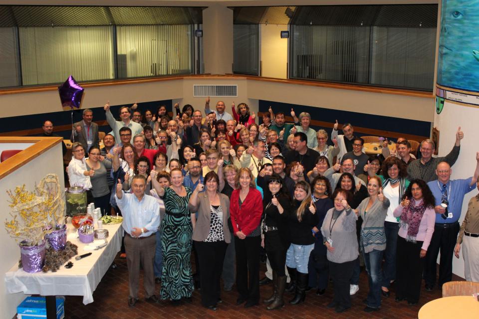 Public Health Division Director, Mark Williams and department staff celebrating the re-confirmation of our Cabinet Secretary for the Dept. of Health, Retta Ward, and our Deputy Secretary, Lynn Gallagher.