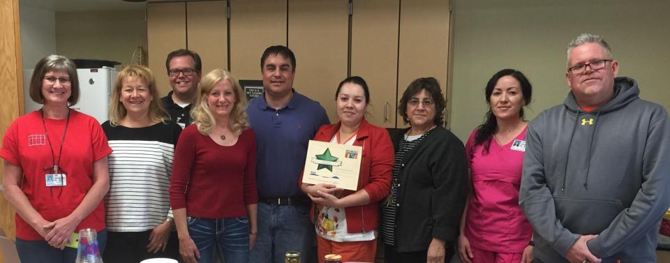 Our Southeast Region Director, Jeff Lara, honoring his clerical staff with a Star Performer Award for outstanding customer service.