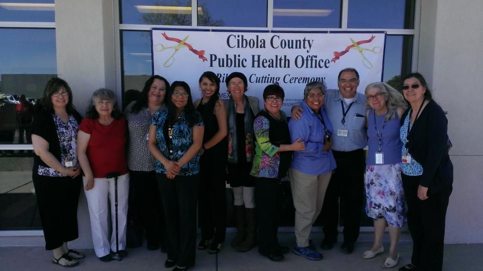 Deputy Director of Regions, Barbara Howe celebrating with Northwest Region Director, Connie Dixon and her staff at the new public health office in Grants, NM