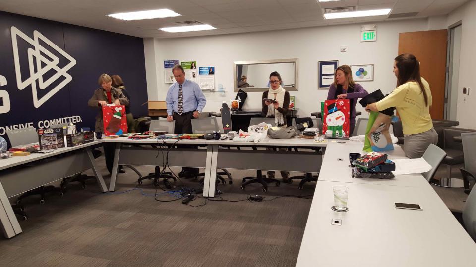 STS HQ Packing gifts for Holiday Donations, 2015