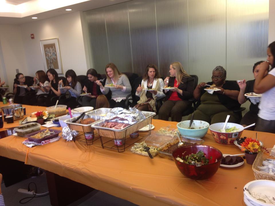 HBP employees and partners gather around the table for our annual Thanksgiving Potluck lunch.