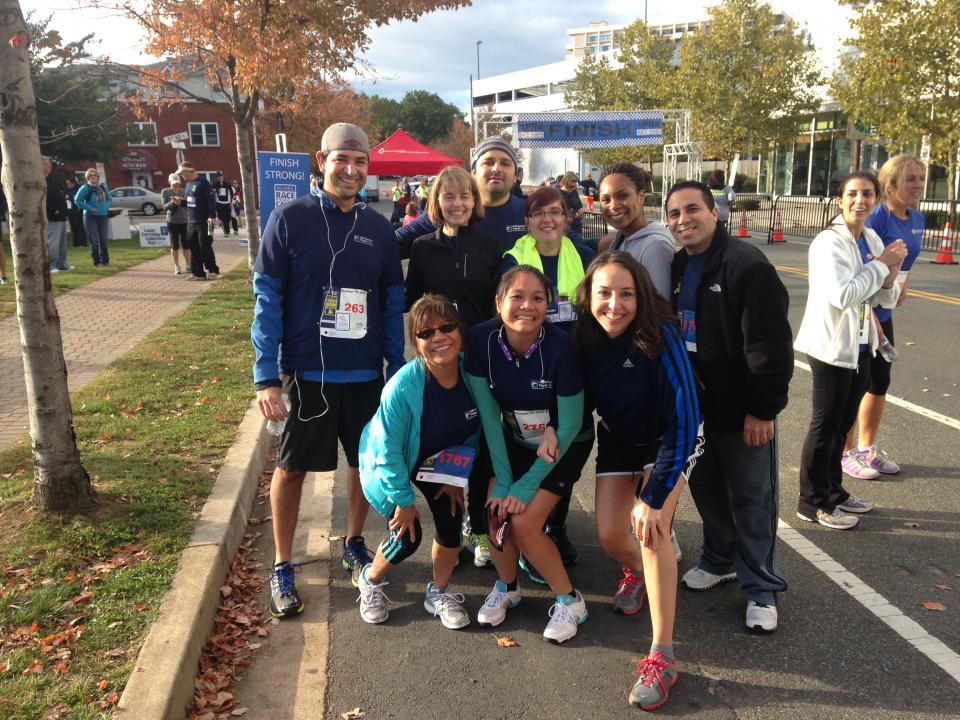 Staff gather together to support a client as well as other great nonprofit organizations during the Acumen Solutions Race for a Cause.