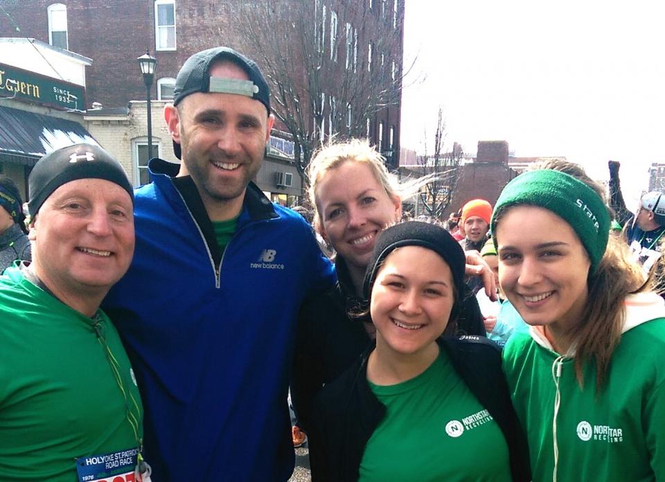 CEO and Co-owner, Seth Goodman, and his Northstar Recycling teammates celebrate finishing the 2015 Holyoke St. Patrick 10K race