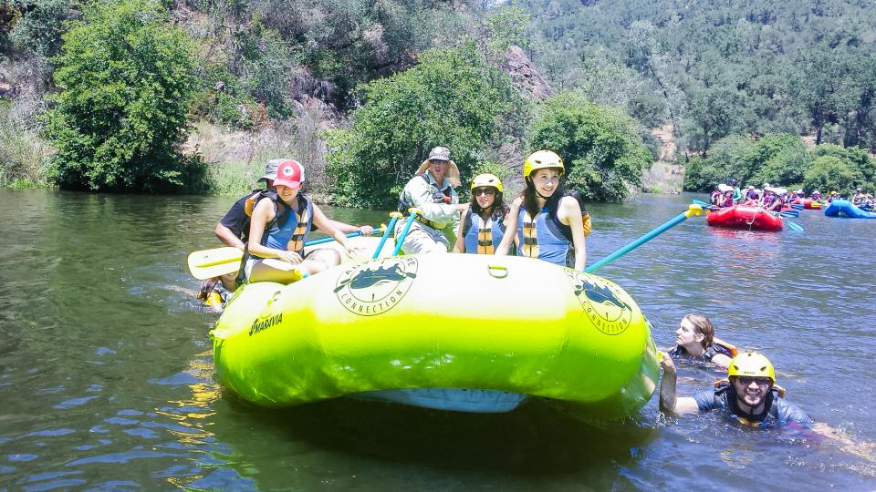 C1 team members enjoying whitewater rafting during our summer team building activity