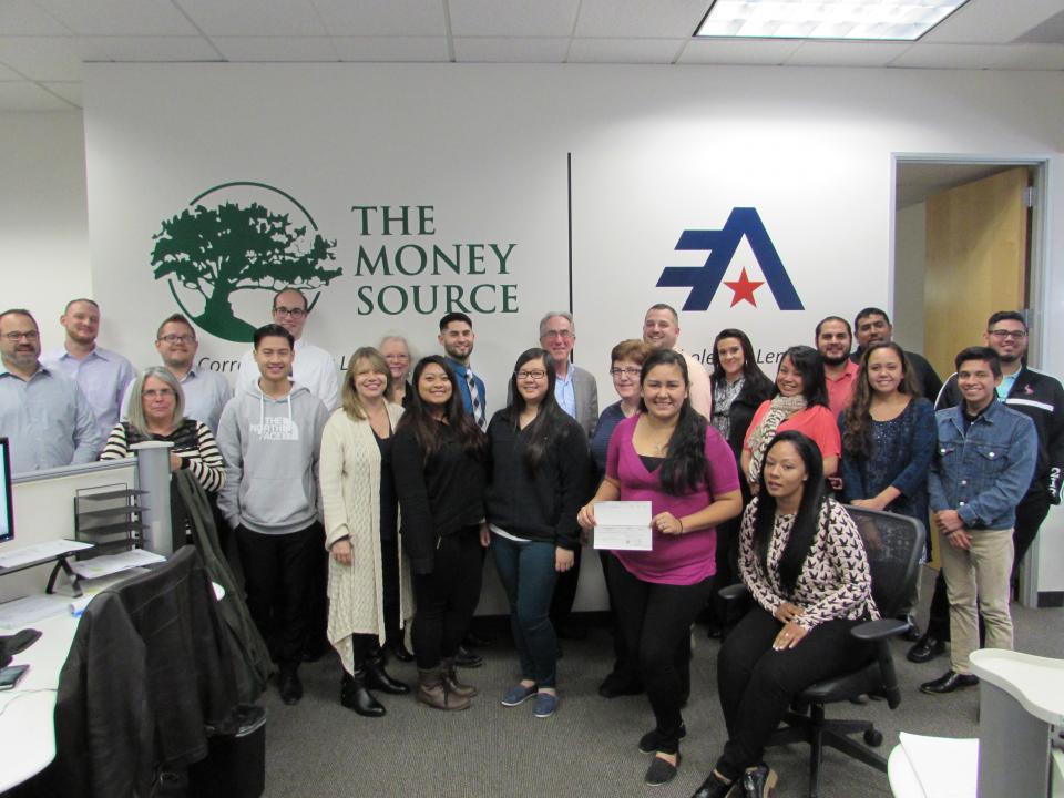 We gathered for a quick photo to celebrate the money we raised during Thanksgiving to donate to our local food bank.