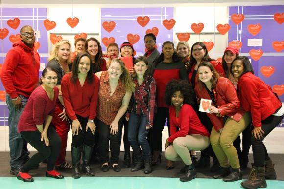 The H+K New York office celebrates National Wear Red Day.