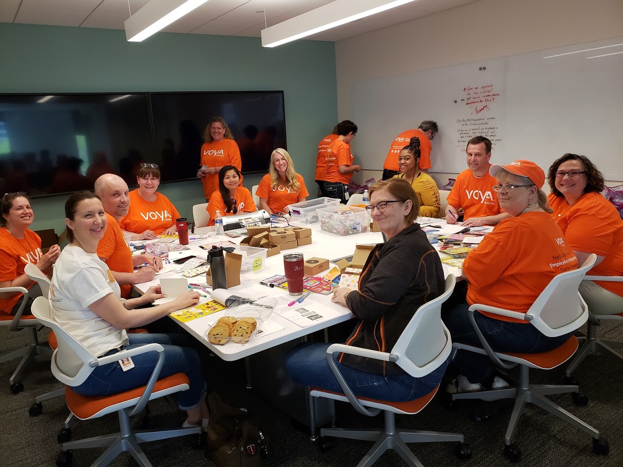 Voya employees volunteering to distribute food with Foodshare.