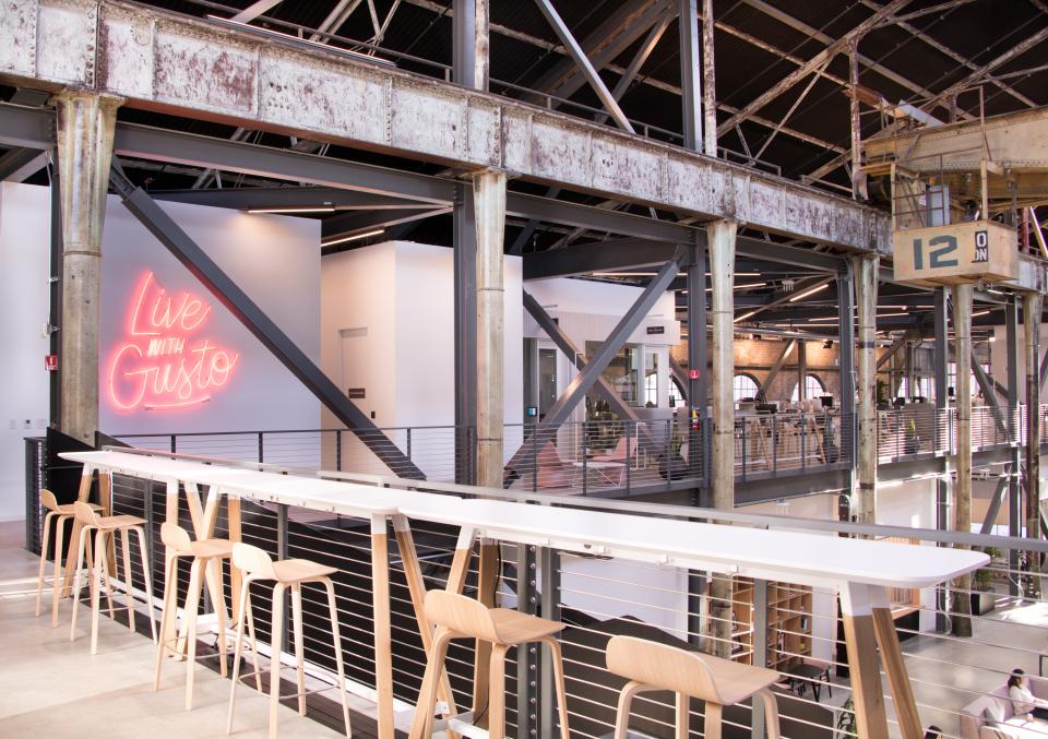 A six-by-six-foot neon sign on the second floor was inspired by the 'we are open' neon signs many small businesses have.