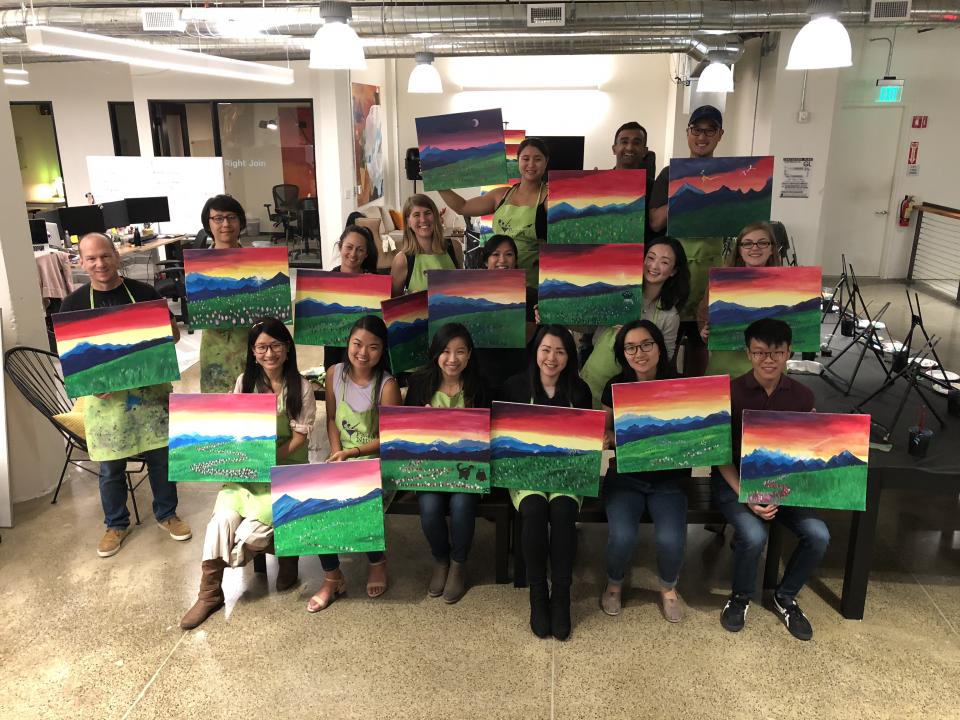 Periscopers enjoy an evening of painting in the office!
