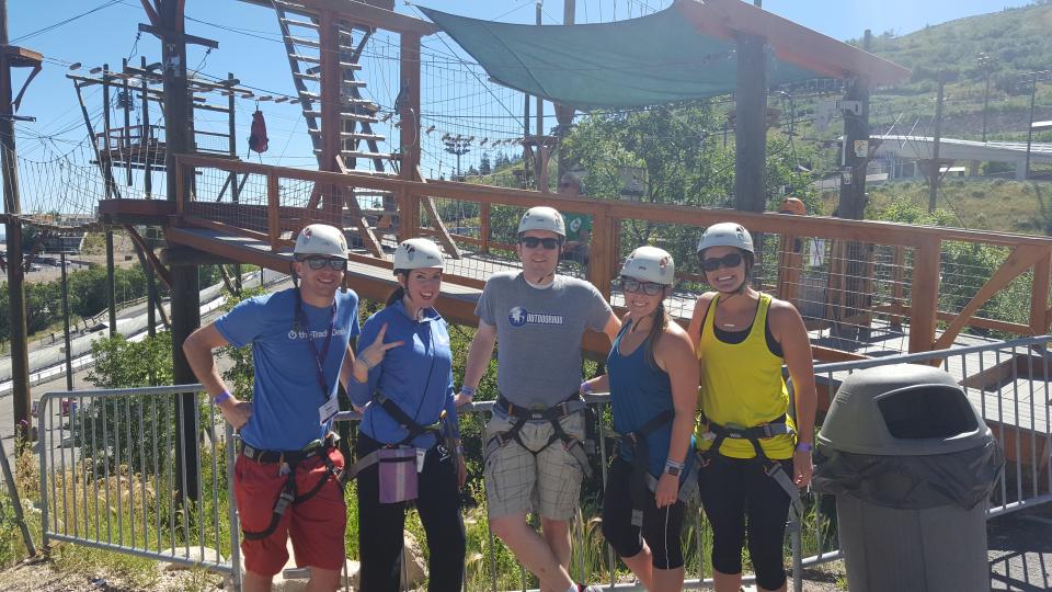 Media team members on a ropes course