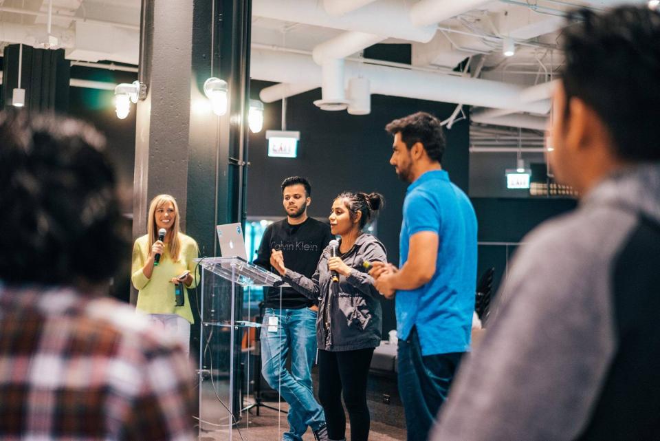 A team presents at the Uptake hackathon