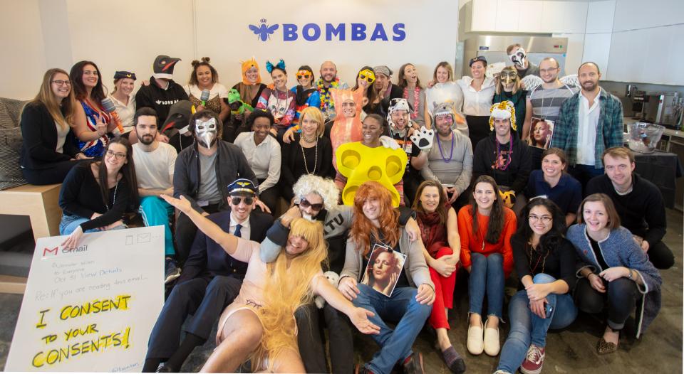 Bombas employees painting a mural for a Giving Partner in Brooklyn, New York. 