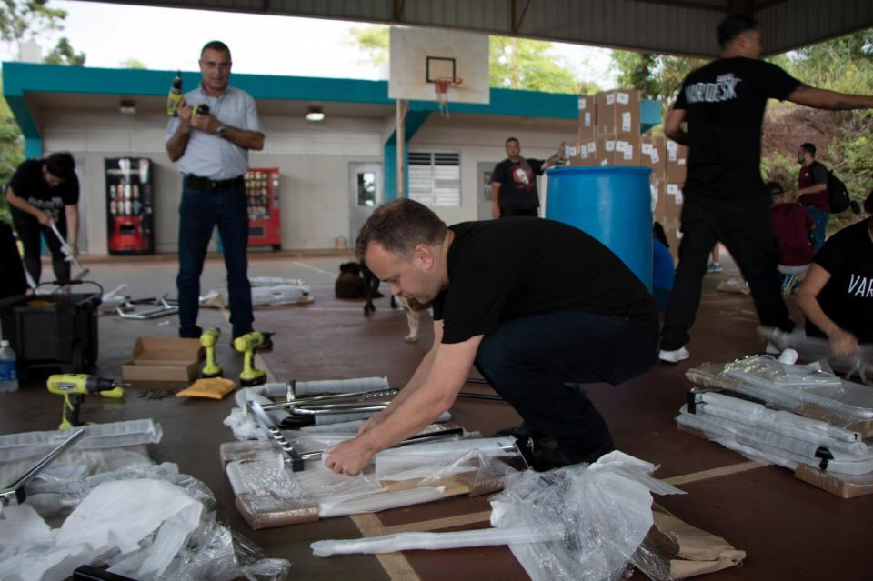 Vari employees volunteering at North Texas Food Bank. In under two hours, we packed over 9 pallets of food. 