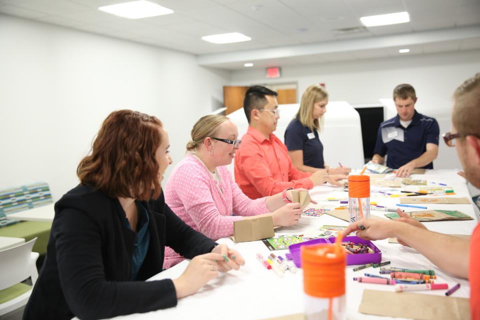 SVA employees participating in a holiday fun event in our office