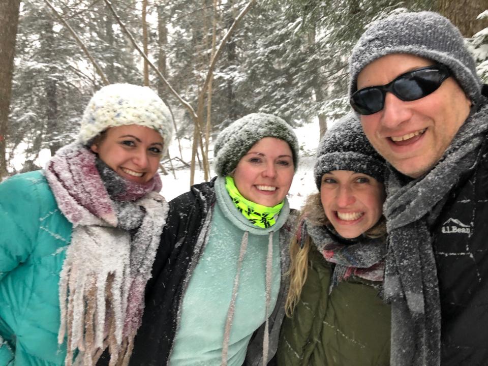 Nuru team members go for a winter hike during annual offsite meeting