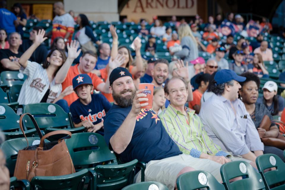 Enjoying an Astros game with the Hartman team