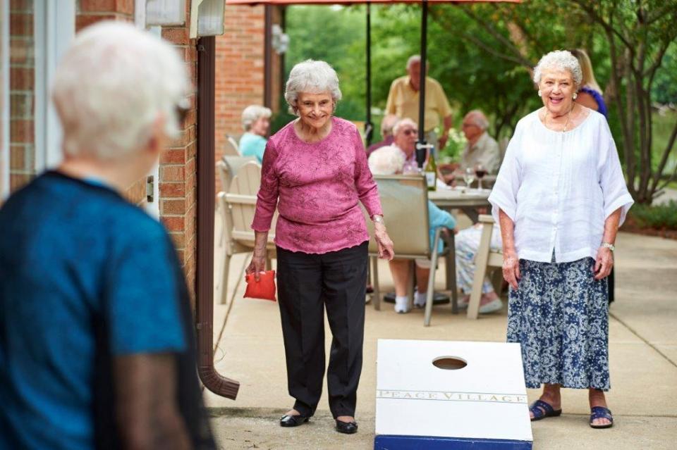 Puppy love at Peace Village! Our residents really love the engagement when the puppies come to visit with them.