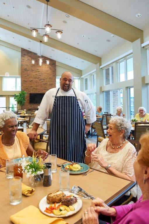 Independent Living residents celebrating Valentine's Day with a special dinner party.