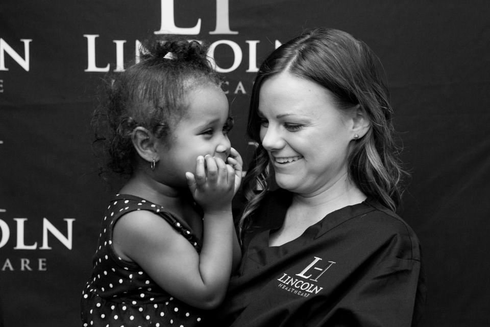 Lincoln Healthcare nurse with pediatric patient