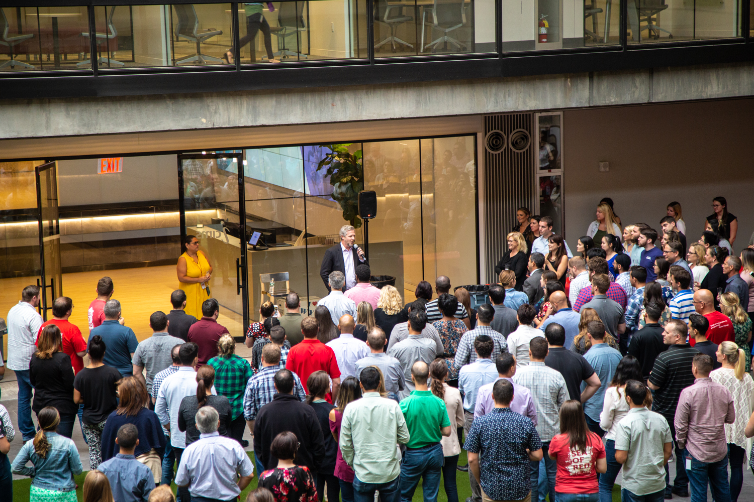 iCIMS Founder, Colin Day, addresses employees at Bell Works office. 