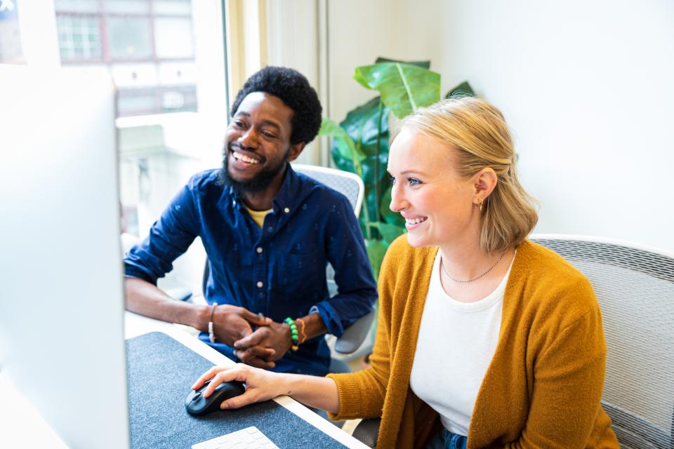 BentoBox staffers working together on a customer website.