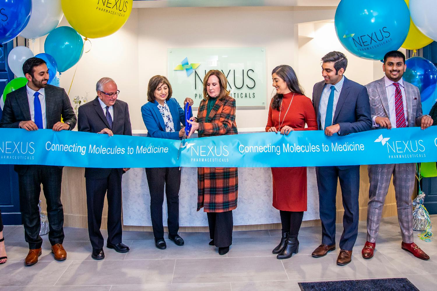 Nexus CEO Mariam Darsot cuts the ceremonial ribbon at our new facility joined by Gov. Tony Evers and other dignitaries.
